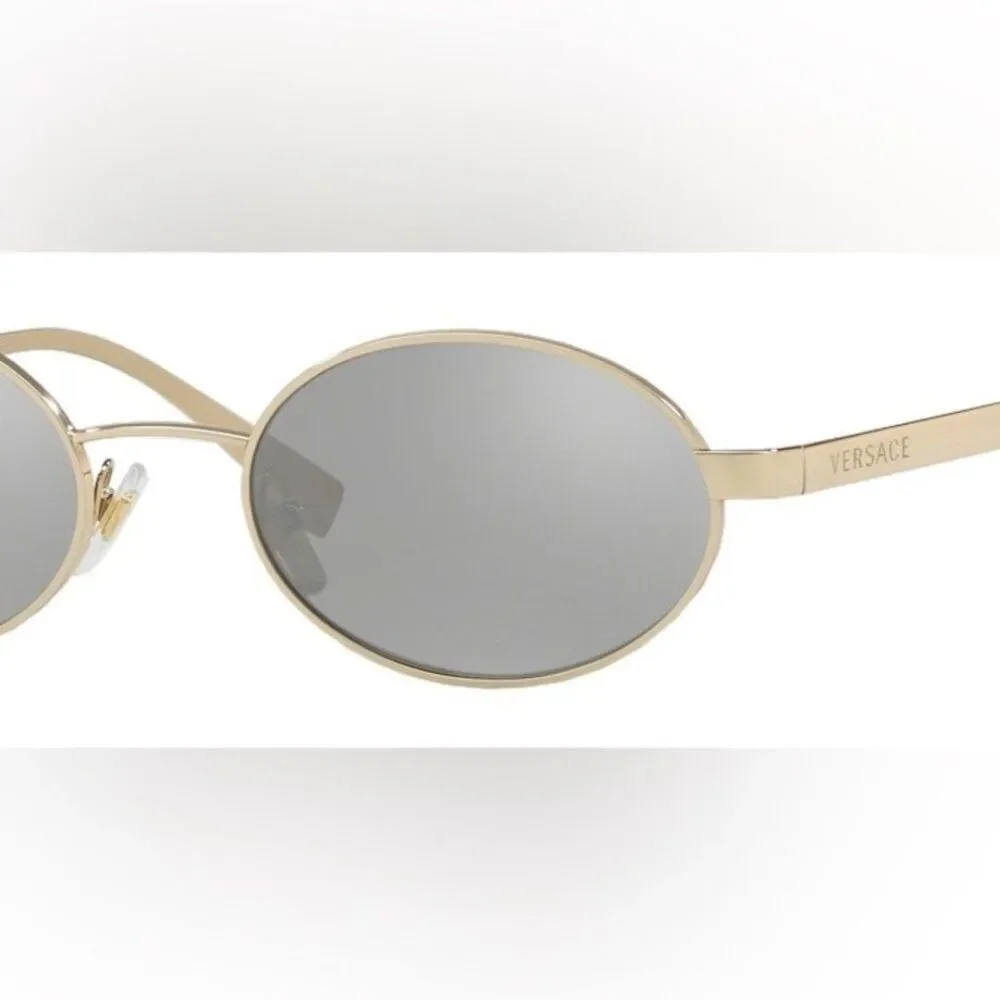 Beautiful  Versace Sunglasses feature mirrored silver lenses and gold rim.